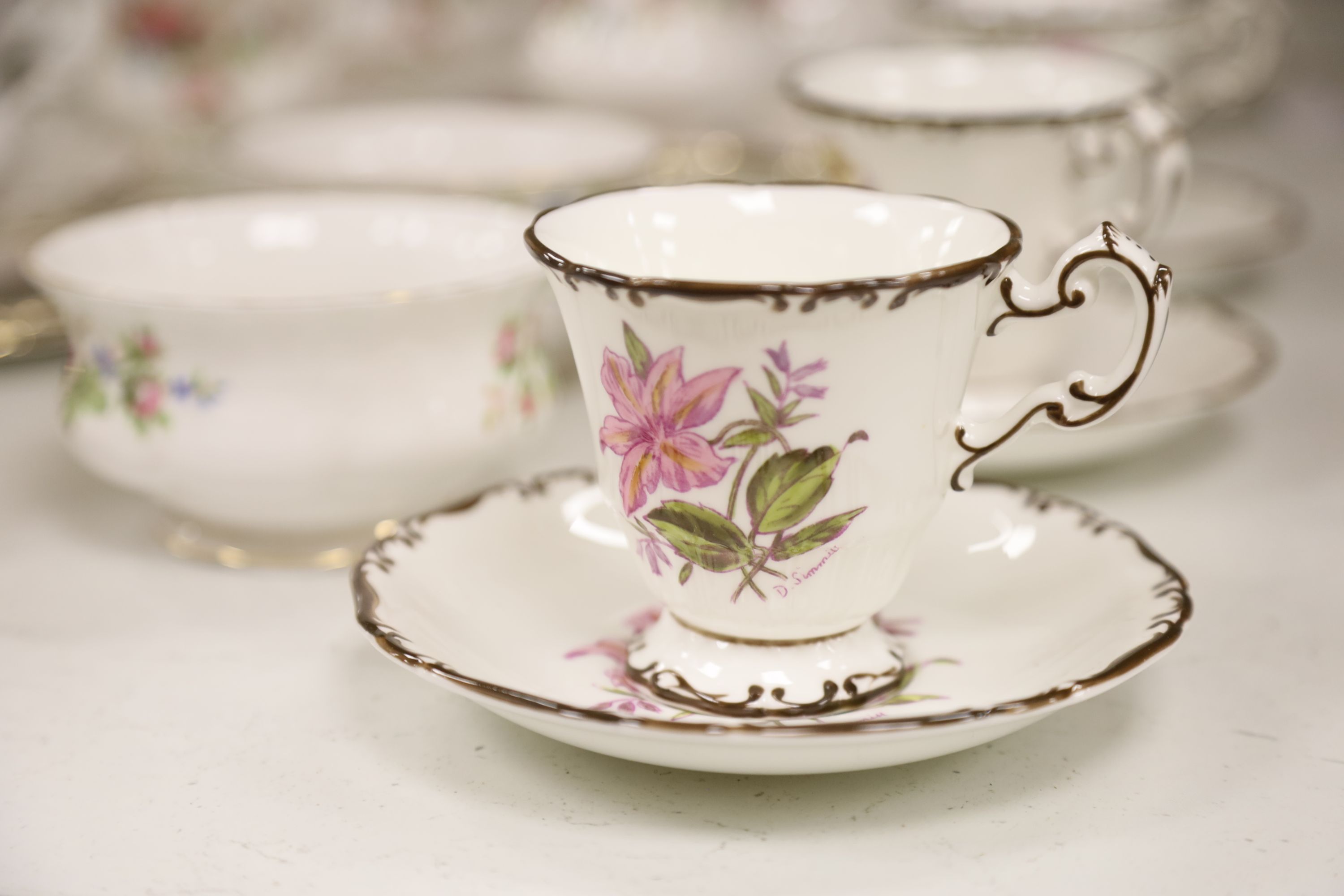 A Royal Albert Moss Rose pattern tea service (41-pce) and a set of four Coalport botanical cups and saucers